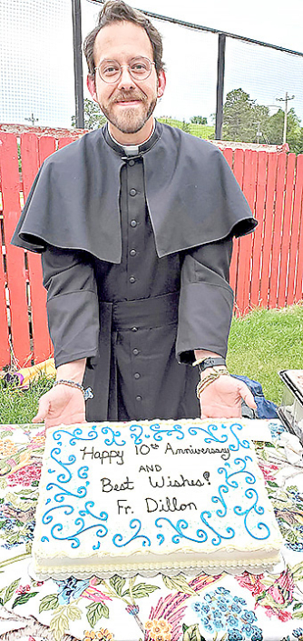 web Fr. Dillon with cake