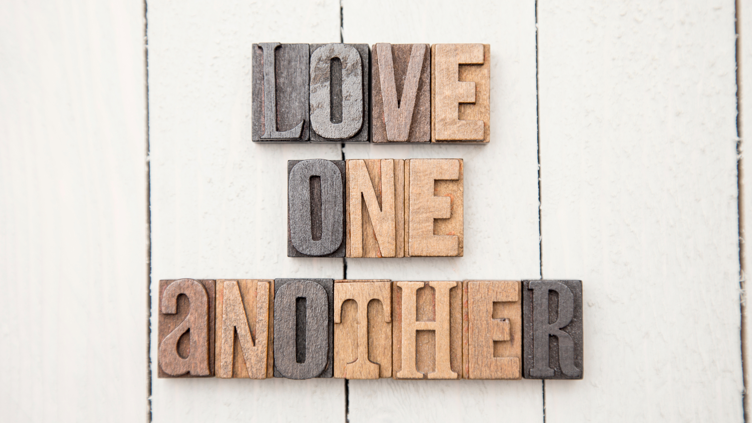 "Love One Another" Spelled in Type Set