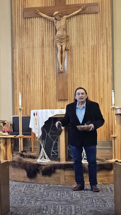 20260131_113214_Lakota Music_Fredrico ‘Kookie’ Ramos Jr & sage_NPM Winter Meeting_St Isaac Jogues,RC,SD_phtg MCN_CROP1
